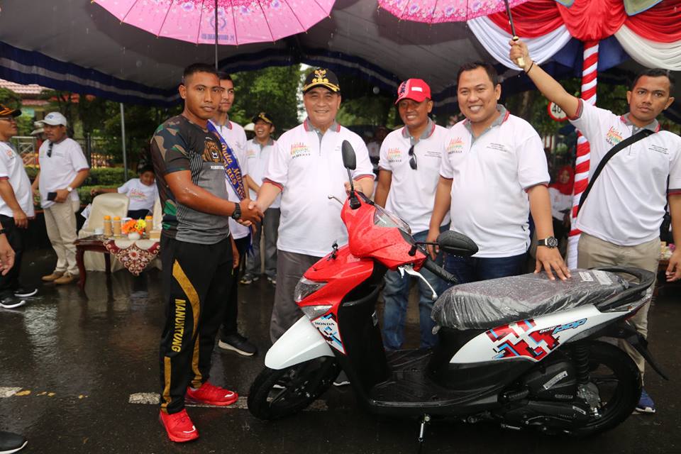 MESKI DIGUYUR HUJAN, MILLENNIAL SAFETY ROAD FESTIVAL BERJALAN DENGAN MERIAH