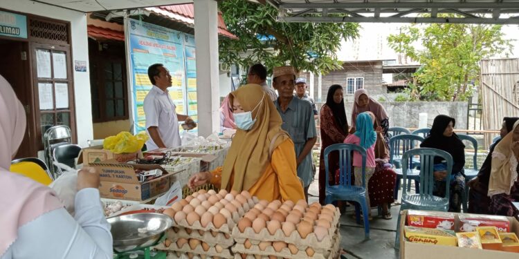 DINAS KETAHANAN PANGAN HSS KEMBALI GELAR PANGAN MURAH TOKO TANI INDONESIA YANG KALI INI BERLOKASI DI DESA BALIMAU