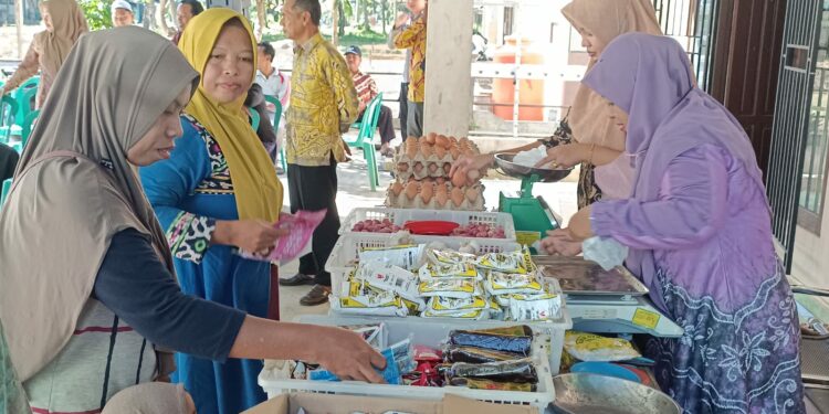 OPERASI PASAR TTI DESA WASAH TENGAH TUAI TANGGAPAN POSITIF WARGA SEKITAR