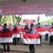 PEMKAB HSS LAKSANAKAN PENCANANGAN GERAKAN PEMBAGIAN DAN PENGIBARAN BENDERA MERAH PUTIH PADA APEL HARI KESADARAN NASIONAL