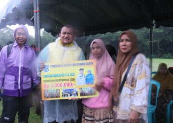 DIGUYUR HUJAN DERAS, PJ. BUPATI HSS TETAP LAKSANAKAN TURKAM BERSEMARAK YANG BERFOKUS PADA PENGETASAN STUNTING, KEMISKINAN EKSTREM DAN PENGENDALIAN INFLASI