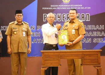 PJ. BUPATI HERMANSYAH SERAHKAN LKPD TA 2023 KEPADA BPK