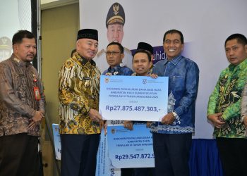PERKUAT KAPASITAS FISKAL DAERAH, BUPATI HSS HADIRI PENYALURAN BAGI HASIL PAJAK DAERAH
